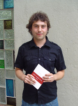 David Caño, amb l'anterior llibre premiat